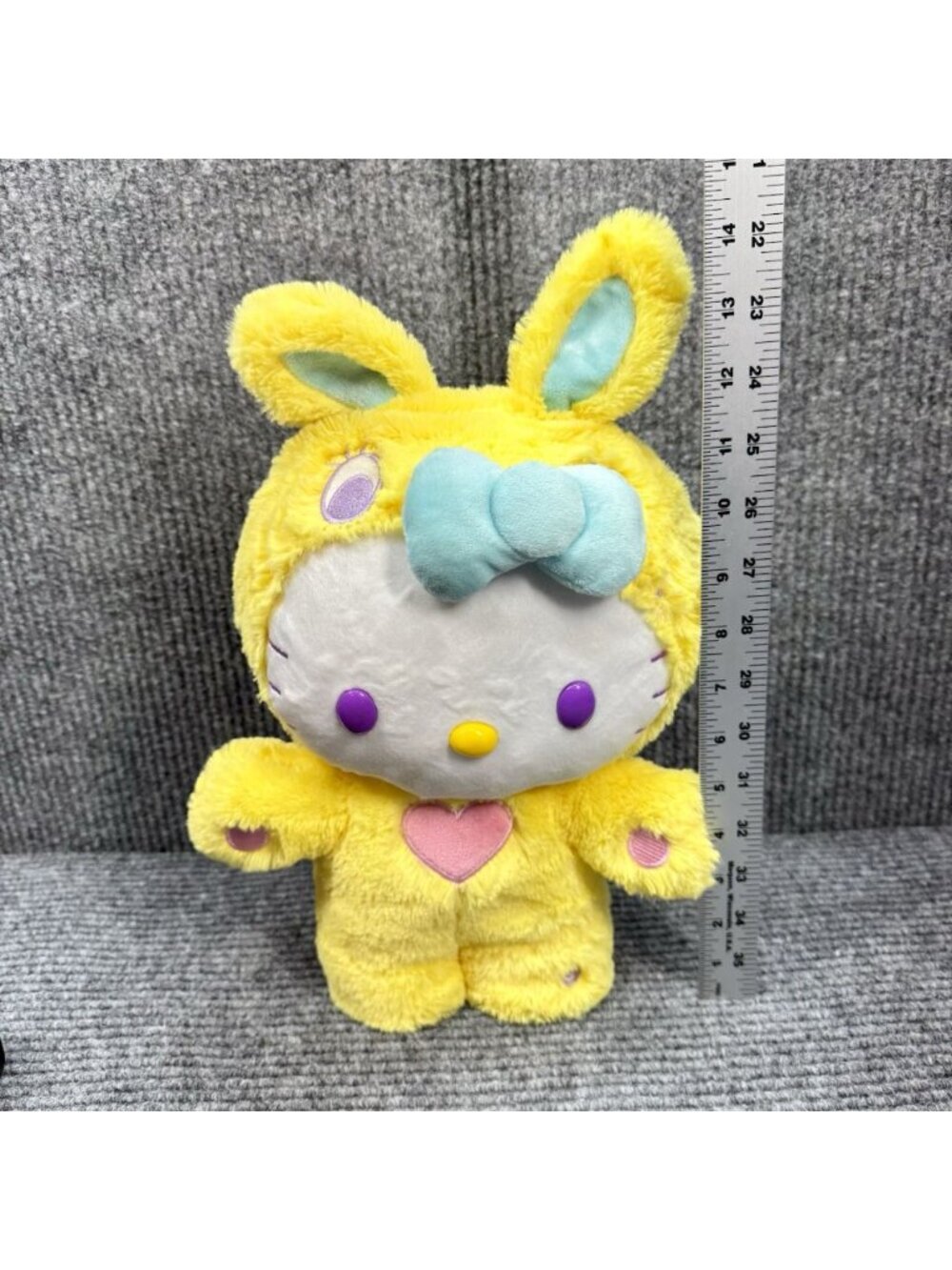 Hello Kitty Gemmy Easter Side Stepper Animated Dancing Plush Yellow Bunny Hop - Picture 3 of 8